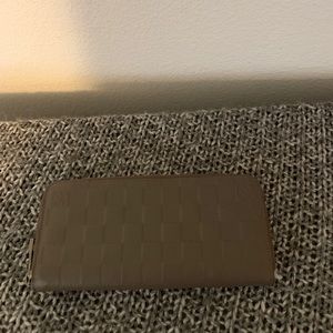 Louis Vuitton grayish brown wallet
